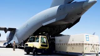 US Air Force Airmen Loading Massive MQ9 Reaper load onto C17 Globemaster III [upl. by Lokim284]