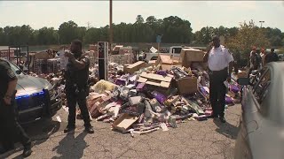 Eviction leaves merchandise from Beauty Mart dumped all over parking lot in Clayton County [upl. by Rahmann]