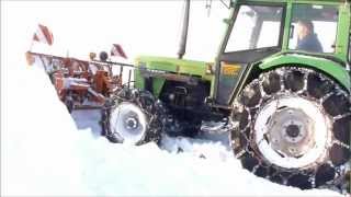 Deutz 6207 im Einsatz  snow plowing with snow chains spikes [upl. by Varini]