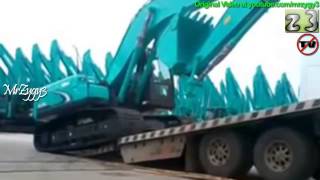 Loading New Excavator Kobelco SK200 Onto Mitsubishi Fuso Truck [upl. by Dammahom]