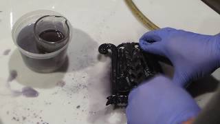 applying 25 tannic acid solution to a cast iron trivet [upl. by Lenhart]