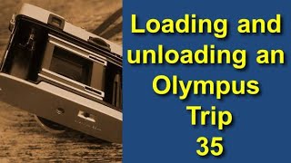 Loading and unloading a film with an Olympus Trip 35 [upl. by Qirat531]