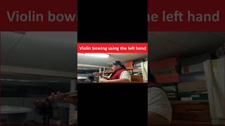 Violin bowing using the left hand [upl. by Sajovich]