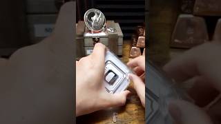 Cracking a Silver Geiger Bar out of its sealed case silver silverstacking geiger [upl. by Wickman]