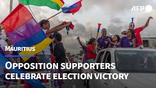 Mauritius opposition supporters celebrate an expected election victory  AFP [upl. by Corrina]