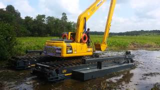 LAUNCHING amphibious excavator swamp KOMATSU PC200 8 LC long arm part 1 [upl. by Einittirb]