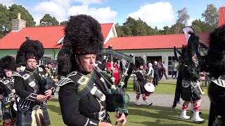 Lonach Pipe Band start displays during 2019 Braemar Gathering outside the Highland Games Pavilion [upl. by Leoine]