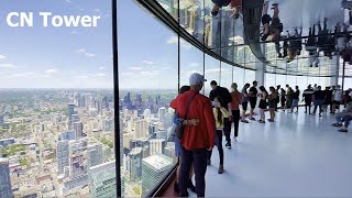 Toronto CN TOWER Inside Walk Around Viewing Deck Glass Floor and CN Tower restaurant [upl. by Alusru]