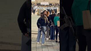 Why do most Israeli girls carry guns inside Jerusalem [upl. by Giustino]