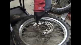 Removing stripped brake rotor disc bolts from a motocross dirt bike motorcycle wheel [upl. by Carree]