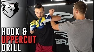 Teaching the Hook amp Uppercut to Beginners quotBicep on Forearmquot [upl. by Einnel]