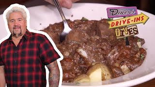 Guy Fieri Eats Irish Guinness Stew in Atlantic Beach  Diners DriveIns and Dives  Food Network [upl. by Nerehs795]