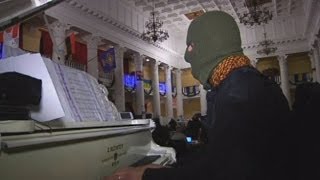 Musical protest Who is the mystery piano man entertaining antigovernment camp in Ukraine [upl. by Konstanze]