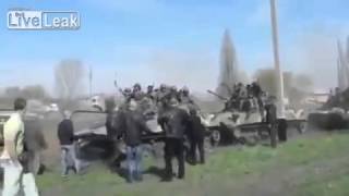 Russian woman stops moving Ukrainian tank [upl. by Linzy]