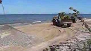 beach cleaning by excavators [upl. by Esinart]