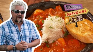 Guy Fieri Eats Dynamite Shrimp Creole in Mississippi  Diners DriveIns and Dives  Food Network [upl. by Ahsatel503]