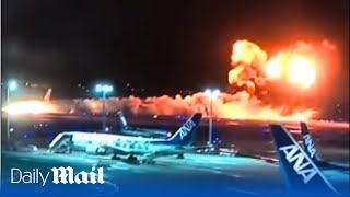 Japan plane inferno Flames engulf airliner in Tokyo carrying more than 300 passengers [upl. by Aicirtap]