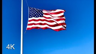 Large American Flag Waving in the Wind Sound Effect and Stock Video  Solid Blue Sky Background  4K [upl. by Evangelist]