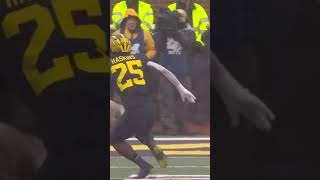 Hassan Haskins CRAZY Hurdle Michigan vs Ohio State shorts [upl. by Nnylf]