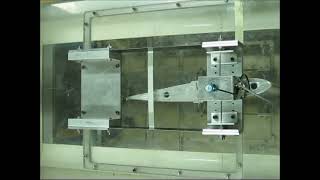 UWAA video 2013 From LCO to Divergent Flutter  2D 3dof wingflap model in the UWs 3x3 wind tunnel [upl. by Dobbins]