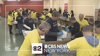 Volunteers get into Season of Giving at New Jersey Community Food Bank [upl. by Philbrook611]