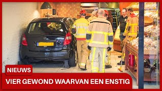 Auto rijdt dwars door pui van bakkerij in Uchelen vier gewonden waarvan een ernstig [upl. by Kcerred]