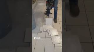 Fast amp quick ceramic tile removal chipping hammer pops up tile like popcorn🍿 milwaukee tools [upl. by On]