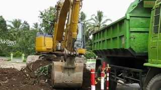 Excavator Komatsu PC228 Loading Dump Truck [upl. by Aisital]