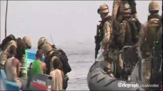 Somali pirates arrested after Royal Navy helicopter chase [upl. by Leonteen531]