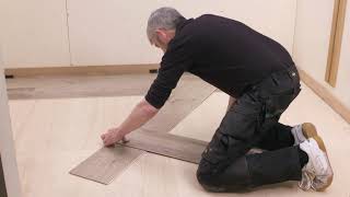 How to cut and fit a rigid vinyl plank to the wall  Karndean [upl. by Aihseuqal]