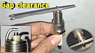 Adjusting spark plug clearance [upl. by Urita690]