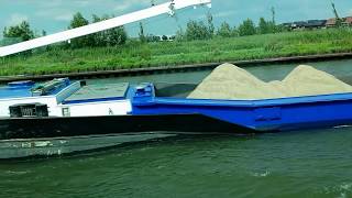 Working Barge powers along the AmsterdamRhine canal The Netherlands  Uniworld River Cruise [upl. by Ainatnas]