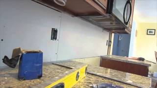 Glass tile backsplash instalation time lapse [upl. by Alimac]