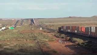 BNSF 4X Power Stack Train near Winslow AZ I40 slowing for traffic jam [upl. by Naillimixam980]