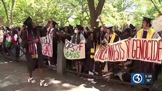 Students walk out during Yale graduation ceremony [upl. by Yrailih]