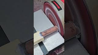 Person is destroying a tube of lip gloss with a sander [upl. by Roseline654]