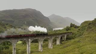 Steam Train Hogwarts Express at Glenfinnan Viaduct 4K Drone footage [upl. by Nairad662]