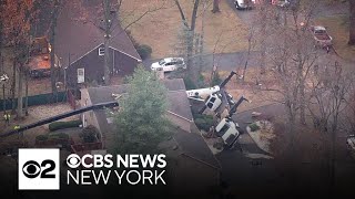 Crane falls onto house in Montville New Jersey [upl. by Lovell]