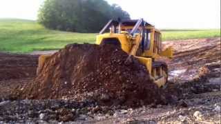 CAT D9G Pushing dirt [upl. by Nnayrrehs]