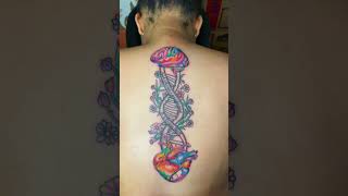 Tattoo Artist Spine Tattoos Colorful Brain FlowersDNA Heart Women Charlotte ColumbiaSC [upl. by Thomey]