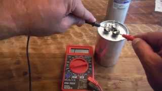 How to test a Dual Run Capacitor from Air Conditioner with a Multimeter [upl. by Prudhoe90]