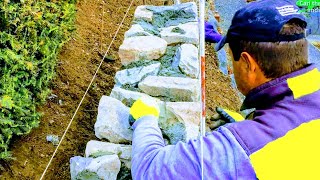 NATURSTEIN HANGMAUER GRAUWACKE VERMÖRTELT PROFI MAURER TIPPS STEINHAUER BAUSTELLEARBEIT ANLEITUNG [upl. by Aiekam]