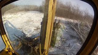 Dynahoe backhoe clearing bush [upl. by Josler]