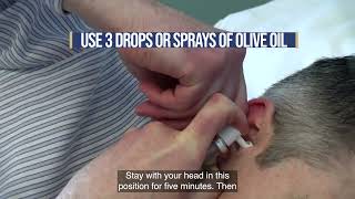 Using olive oil to treat a build up of ear wax [upl. by Nagiam]