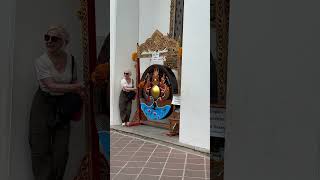 How to Gently Bang a Gong at the temple in Bangkok Thailand [upl. by Eissahc]