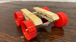 How to make a quick minicar from rubber bands with clothespins at home [upl. by Troth]