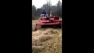 Hesston 320 swather self propelled mower [upl. by Elstan]