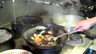 Cooking How to use a Chinese wok [upl. by Elleryt620]