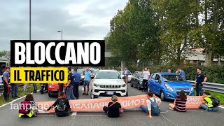 Ultima Generazione blocca traffico a Milano quotServono fondi per vittime delle catastrofi climatichequot [upl. by Nivlak]