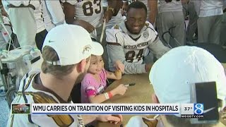 WMU football team visits Children’s Medical Center in Dallas [upl. by Ymac]